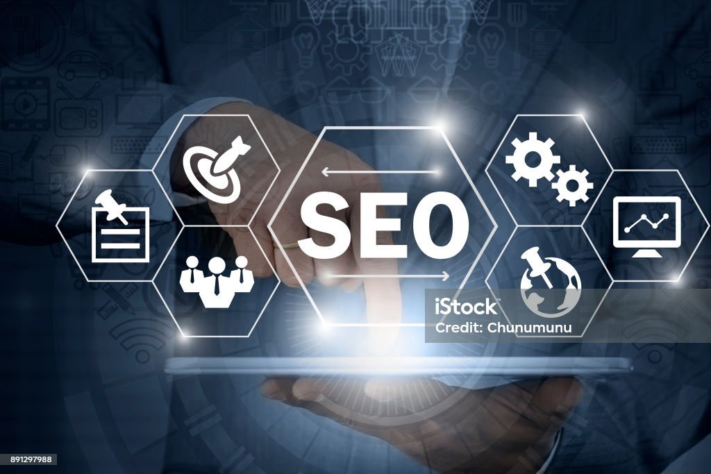 SEO illustration with icons and hexagons, hand holding a tablet